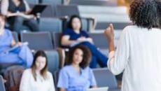 medical workers sitting in a lecture hall